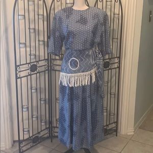 Slitted skirt and shirt set with side tie.